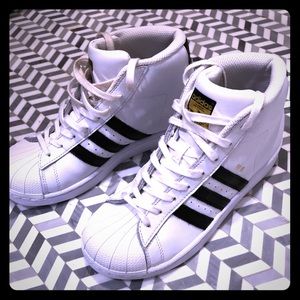 Girls high top Adidas sneakers